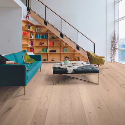 white oak hardwood floors in Scandi style living room with large windows and pops of colour